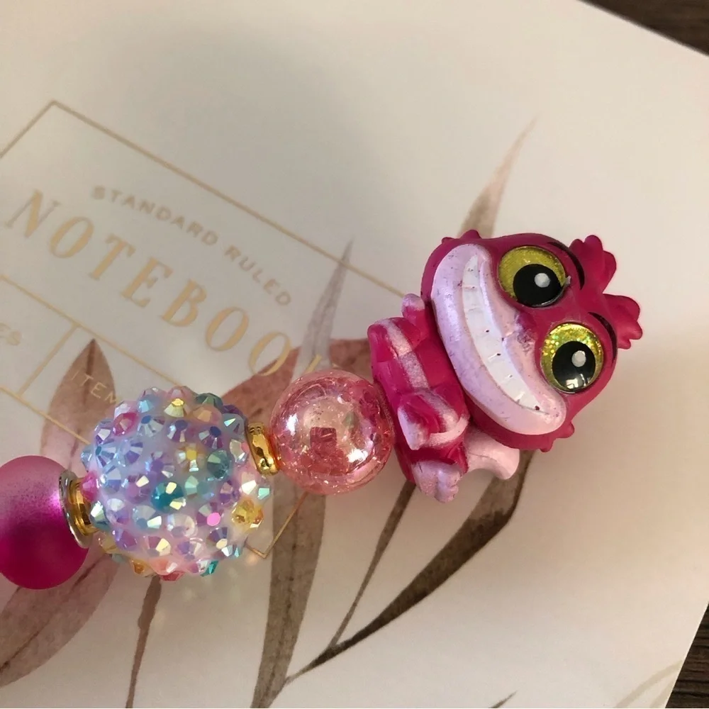 Disney doorables: Alice in Wonderland: Cheshire Cat handmade beaded pen